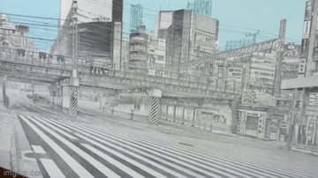 GIF of Shinjyku calling. Grey scale image of the crossing, as the camera pans over the image, faint images of cars and pedestrians appear 